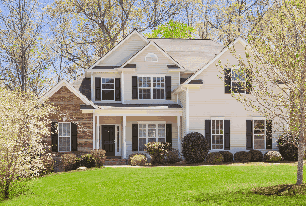 Front view of a beautiful two-story modern house with large windows and clean architectural design.Front view of a beautiful two-story modern house with large windows and clean architectural design.